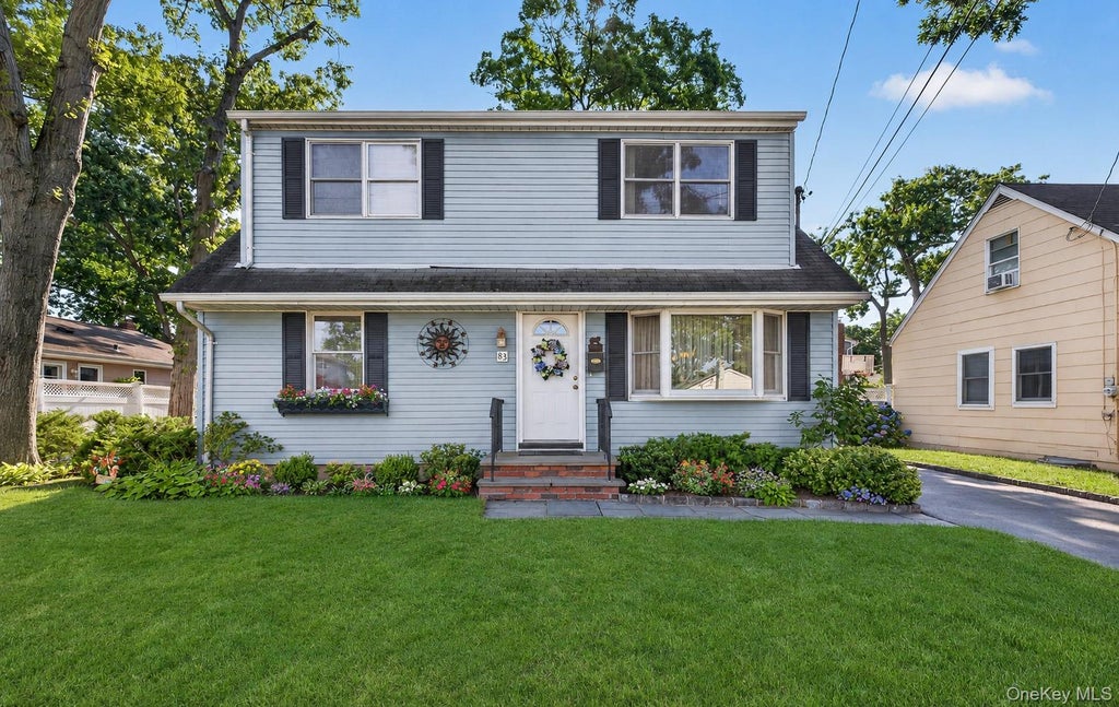 Photo of 83 Whittier Avenue, North Merrick, NY 11566 (MLS # 1028070)