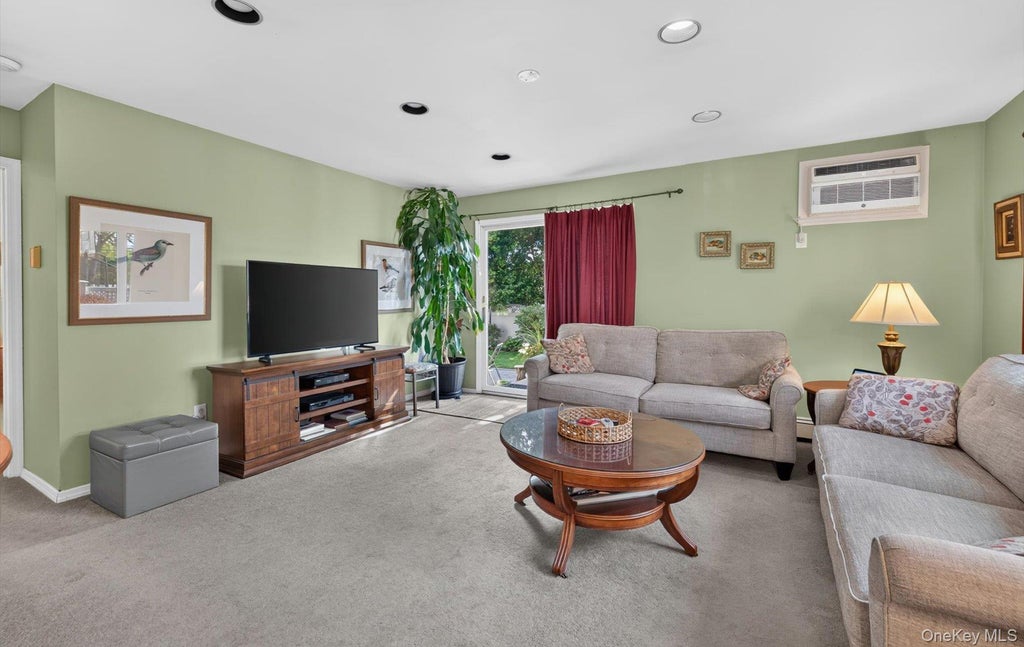 Photo of 83 Whittier Avenue, North Merrick, NY 11566 (MLS # 1028070)