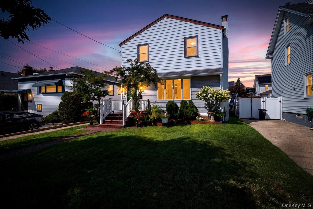 Photo of 48 W Windsor Parkway, Oceanside, NY 11572 (MLS # 1049001)