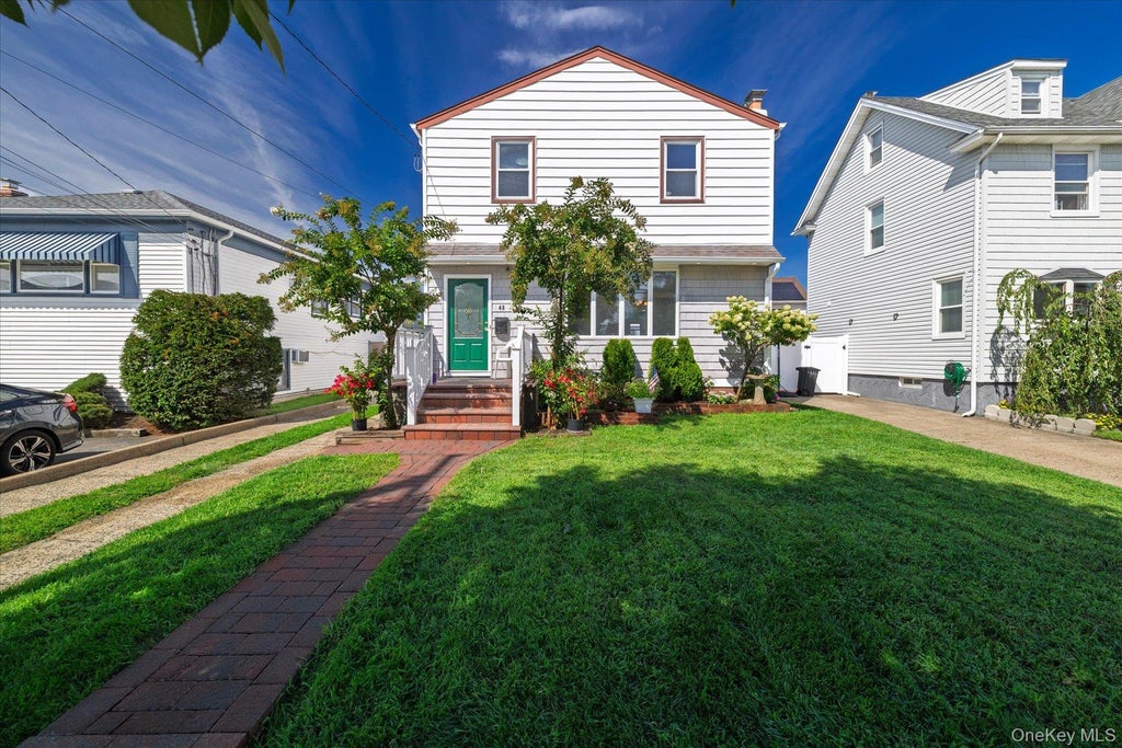 Photo of 48 W Windsor Parkway, Oceanside, NY 11572 (MLS # 1049001)