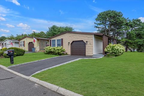 Photo of 96 Village Circle West Cir, Manorville, NY 11949 (MLS # 893429)