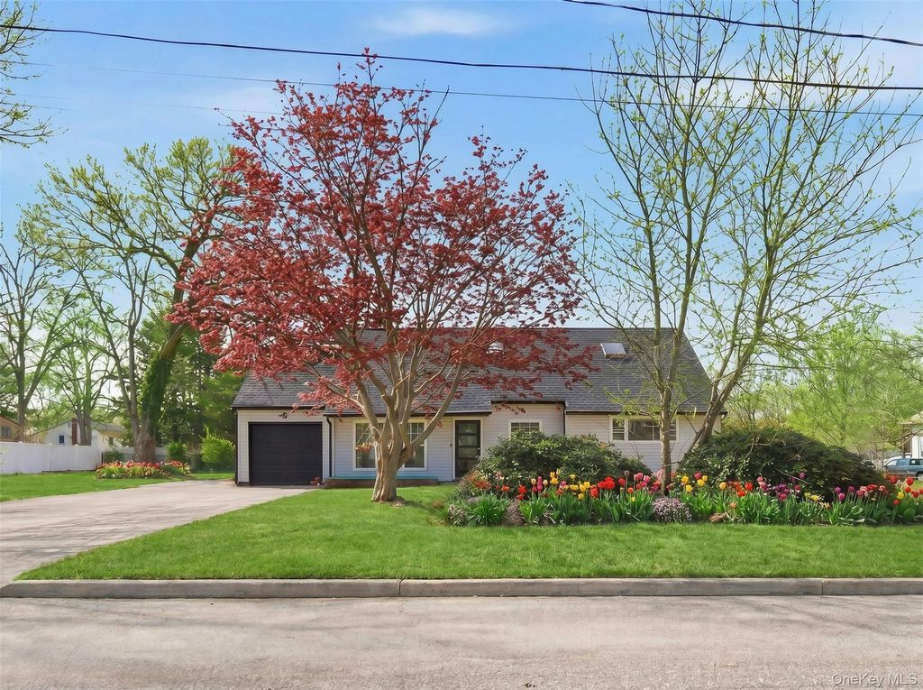 Photo of 56 Pennaquid Road, Coram, NY 11727 (MLS # 989598)