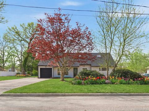 Photo of 56 Pennaquid Road, Coram, NY 11727 (MLS # 989598)