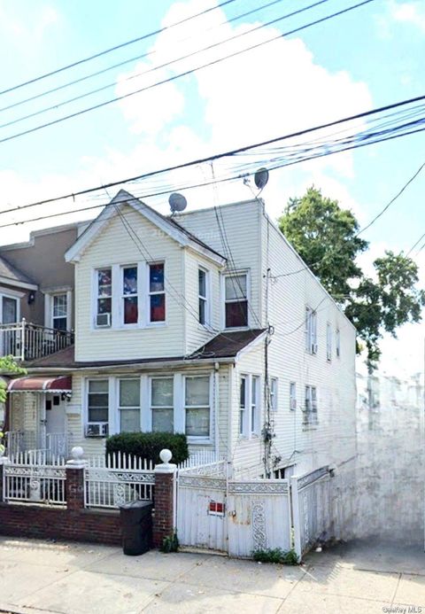 Photo of 86-12 123rd Street, Richmond Hill North, NY 11418 (MLS # 968413)