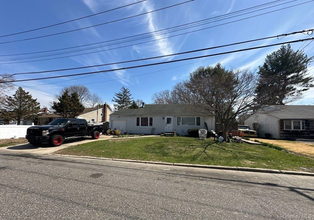 Photo of 12 Glenwood Lane, Huntington, NY 11743 (MLS # 978531)