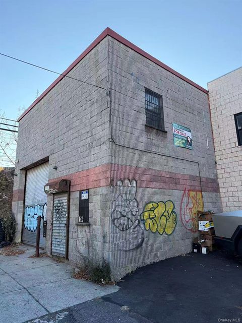 Photo of 70-42 48th Avenue, Woodside, NY 11377 (MLS # 940667)