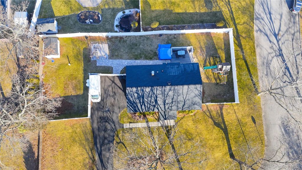 Photo of 35 Essex Drive, Coram, NY 11727 (MLS # 960125)