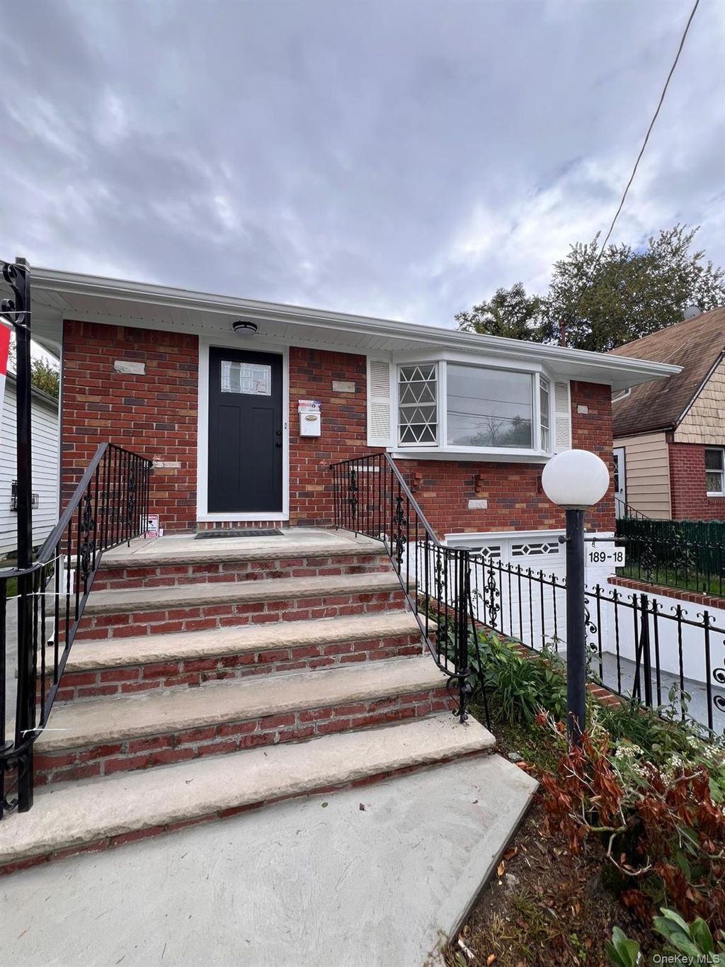Photo of 18918 Tioga Dr Dr, Saint Albans, NY 11412 (MLS # 922407)