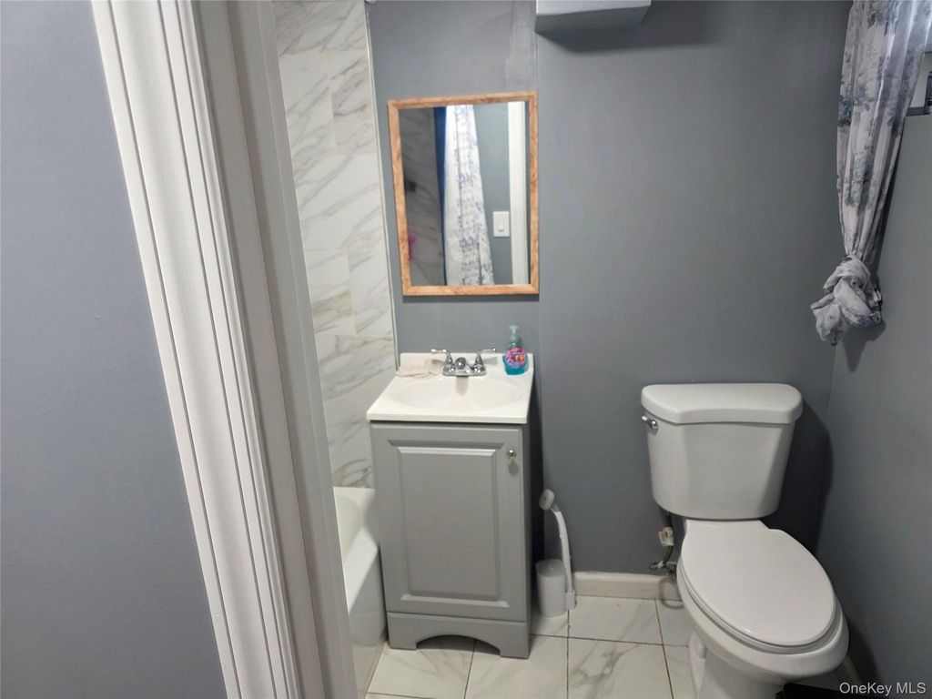 Photo of 226 Swalm Street, Westbury, NY 11590 (MLS # 963849)