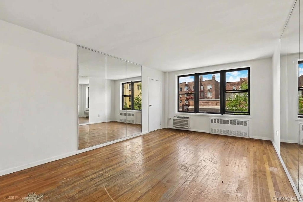 Photo of 41-31 51st Street St #4K, Woodside, NY 11377 (MLS # 1048030)