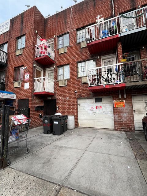 Photo of 40-29 97 Street, Corona, NY 11368 (MLS # 950160)