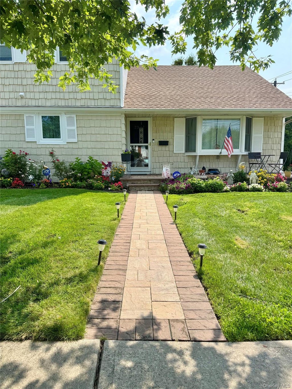 Photo of 2327 Penatiquit Avenue, Seaford, NY 11783 (MLS # 1029541)