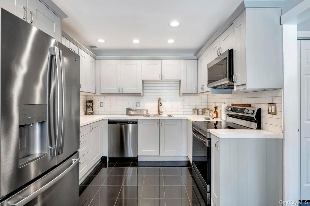 Photo of 114 Birchwood Road, Coram, NY 11727 (MLS # 962188)