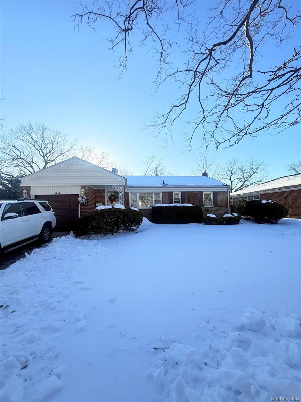 Photo of 896 School Drive, North Baldwin, NY 11510 (MLS # 959120)