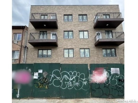 Photo of 55-04 102nd Street, Corona, NY 11368 (MLS # 995116)