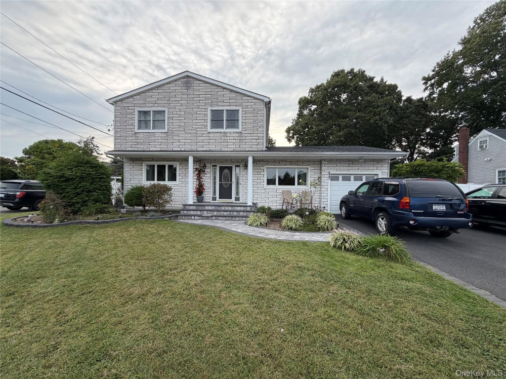 Photo of 822 Coates Avenue, Holbrook, NY 11741 (MLS # 1052525)