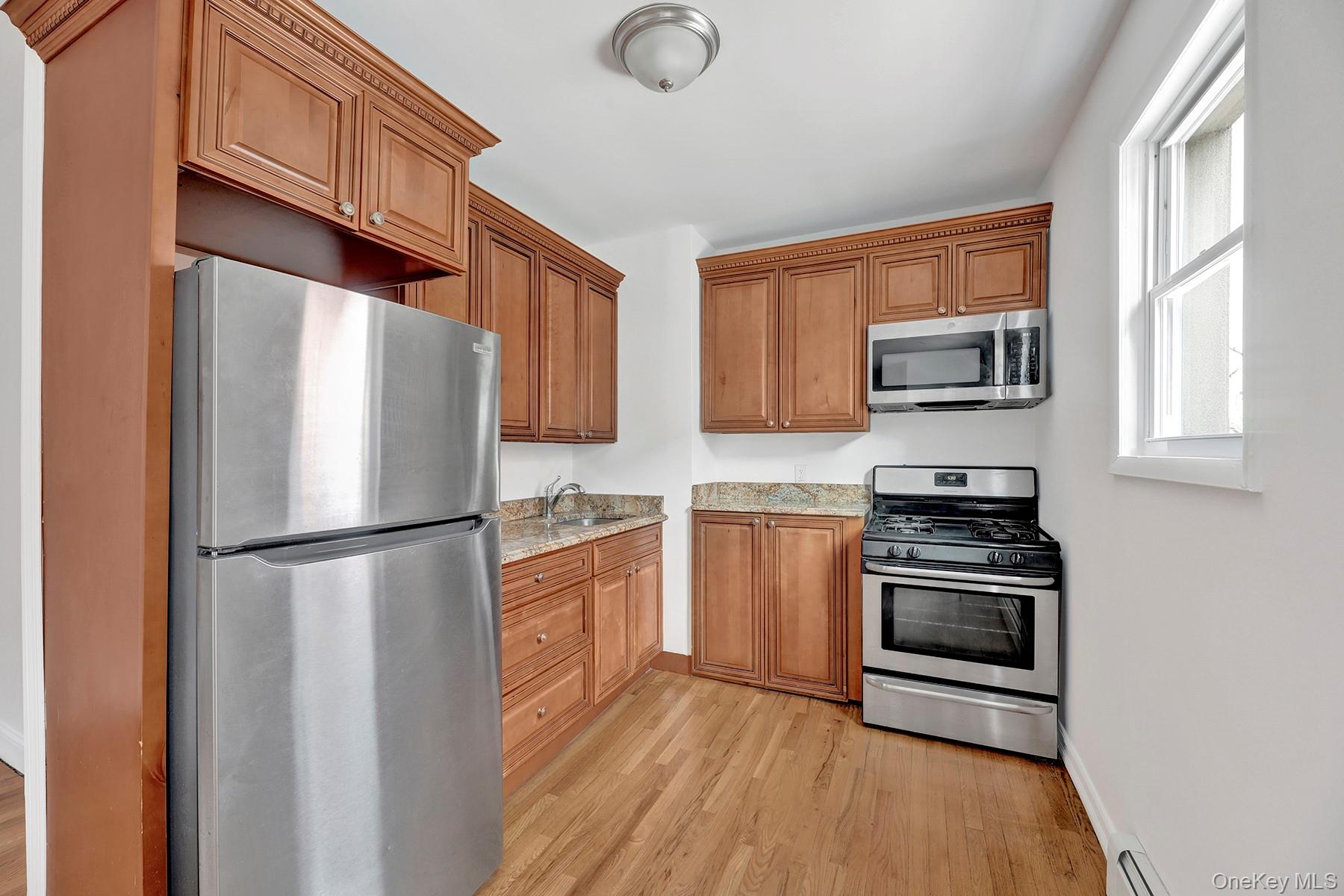 Photo 1 of 13 — 8848 77th Street, Woodhaven, NY 11421