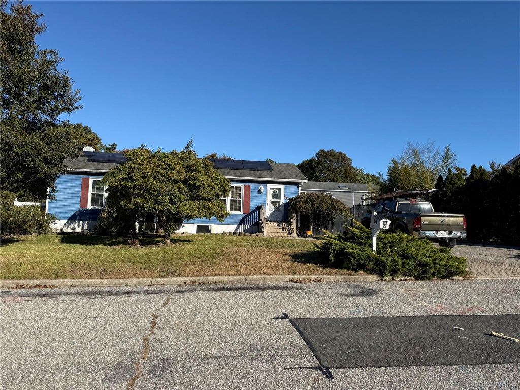 Photo of 109 8th Avenue, Holtsville, NY 11742 (MLS # 1064969)