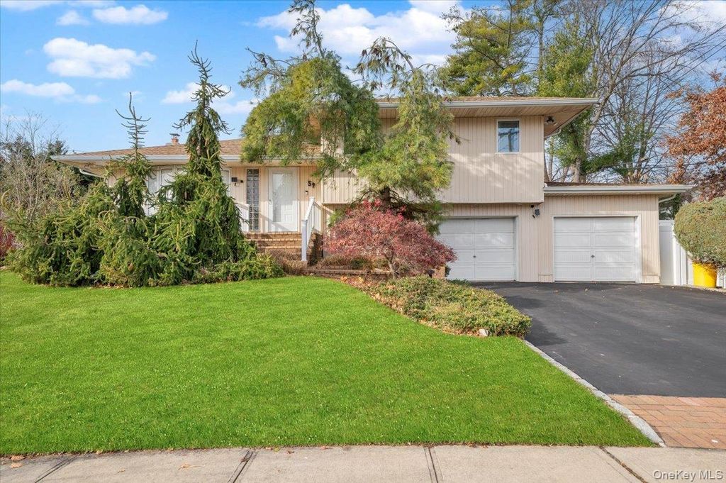 Photo of 59 Hazelwood Drive, Jericho, NY 11753 (MLS # 940965)