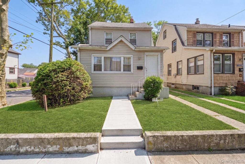 Photo of 188-01 Mangin Avenue, Saint Albans, NY 11412 (MLS # 1060561)