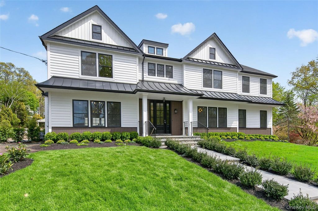 Photo of 15 Ridge Drive, Port Washington, NY 11050 (MLS # 989974)