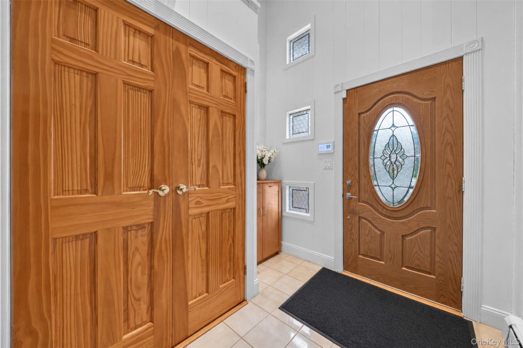 Photo of 68 Hazelwood Drive, Jericho, NY 11753 (MLS # 1055386)