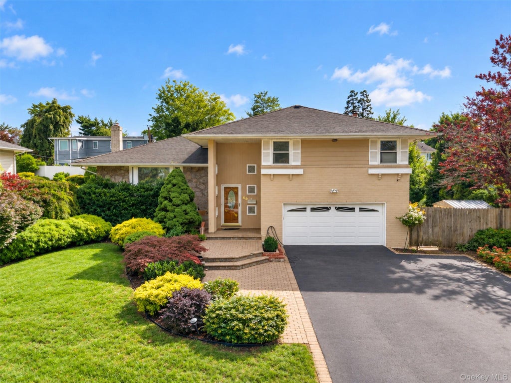 Photo of 68 Hazelwood Drive, Jericho, NY 11753 (MLS # 1055386)