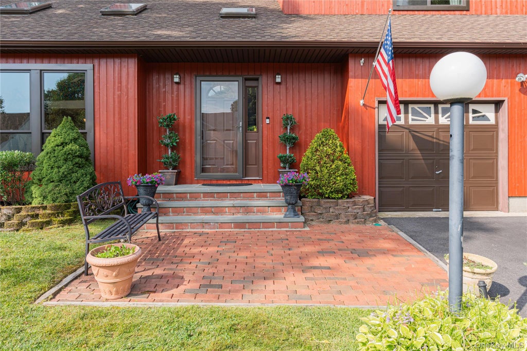 Photo of 20 Debragga Avenue, East Moriches, NY 11940 (MLS # 1028919)
