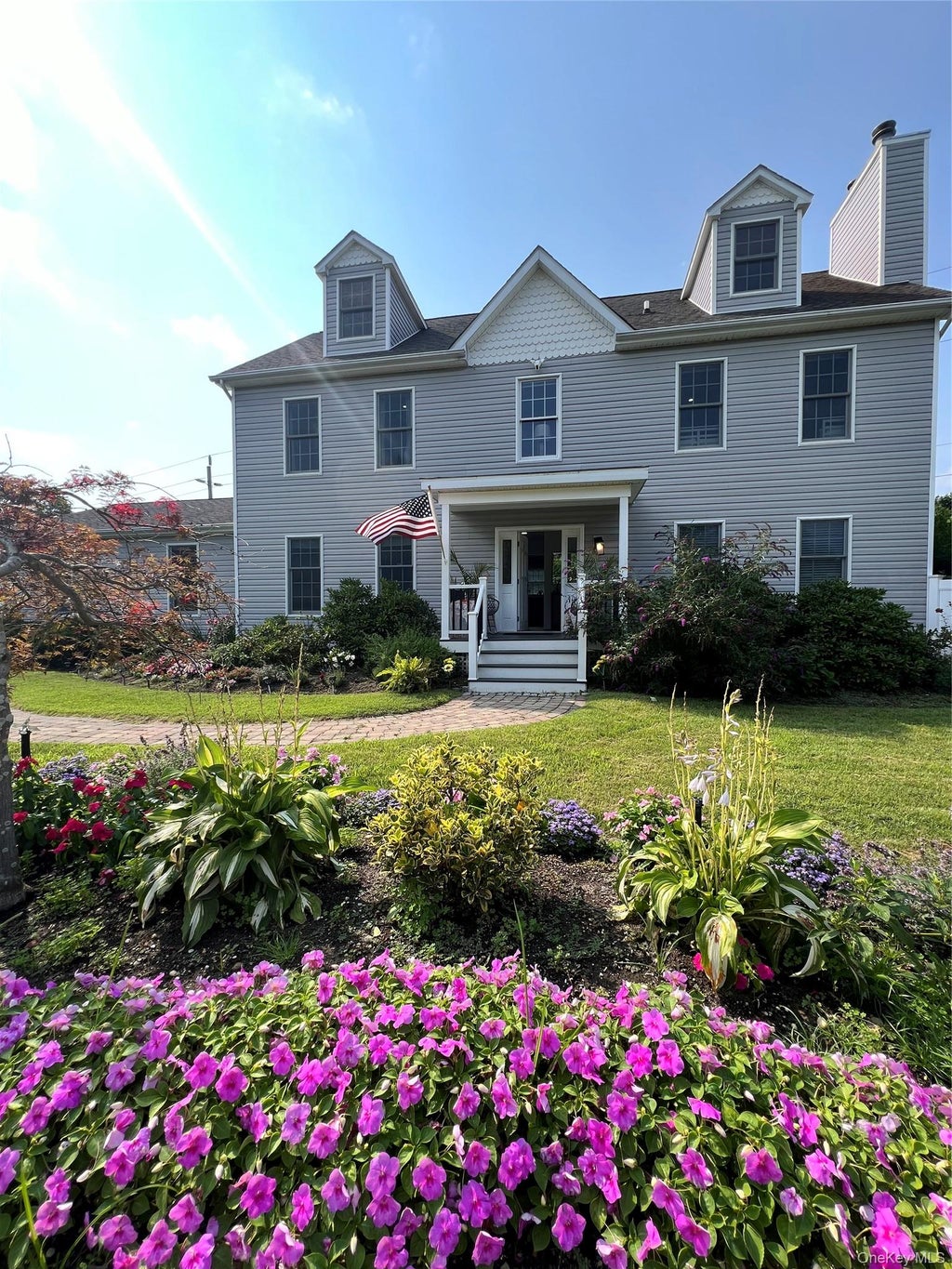 Photo of 2 Box Tree RD, East Quogue, NY 11942 (MLS # 1038939)