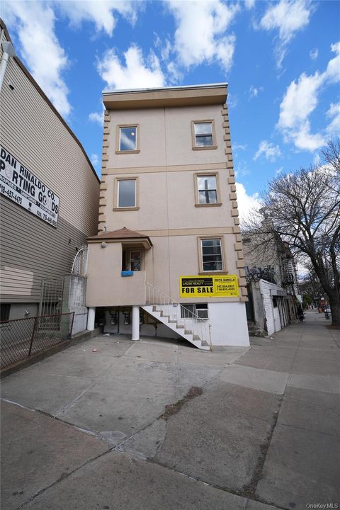 Photo of 56-29 Roosevelt Avenue, Flushing, NY 11377 (MLS # 983555)