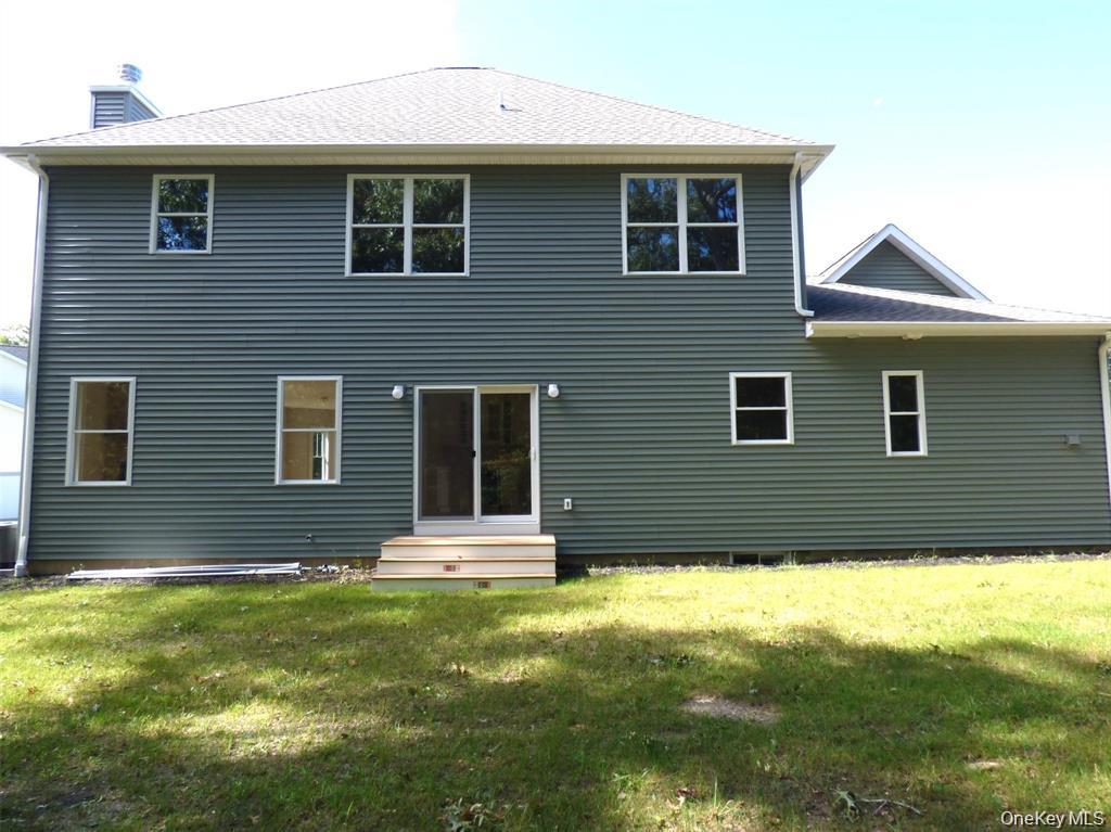 Photo of 5 Lakeland Woods Court #5, Ronkonkoma, NY 11749 (MLS # 1067500)