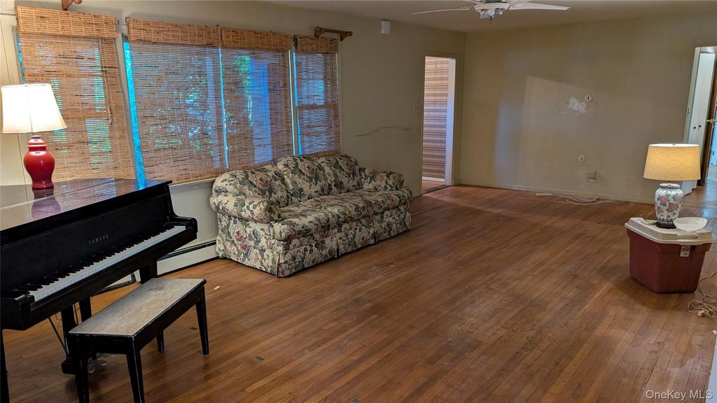 Photo of 14 Tall Tree Lane, Rocky Point, NY 11778 (MLS # 1030164)