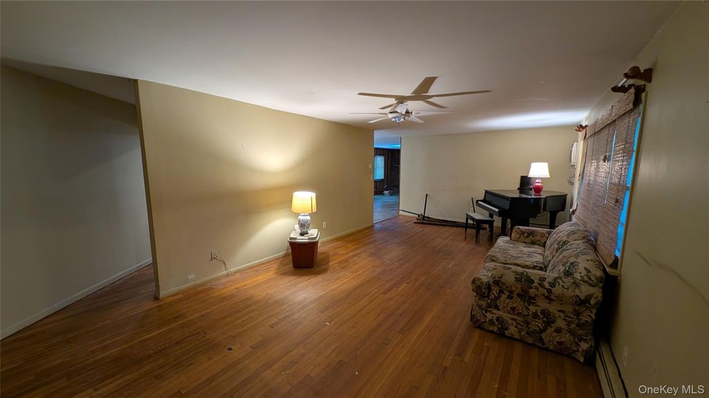 Photo of 14 Tall Tree Lane, Rocky Point, NY 11778 (MLS # 1030164)