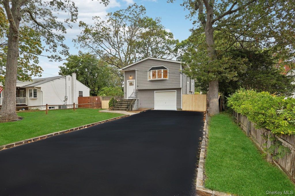 Photo of 109 Rexmere Avenue, Farmingville, NY 11738 (MLS # 922814)