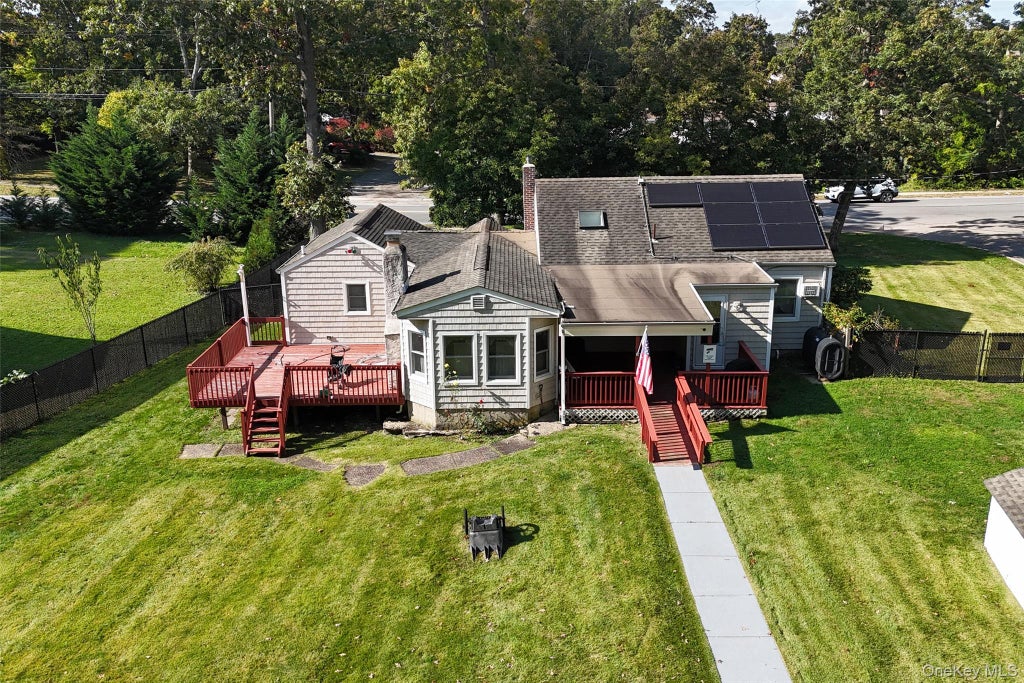 Photo of 1161 Stony Brook Road, Lake Grove, NY 11755 (MLS # 1061535)