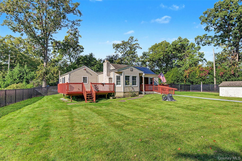 Photo of 1161 Stony Brook Road, Lake Grove, NY 11755 (MLS # 1061535)