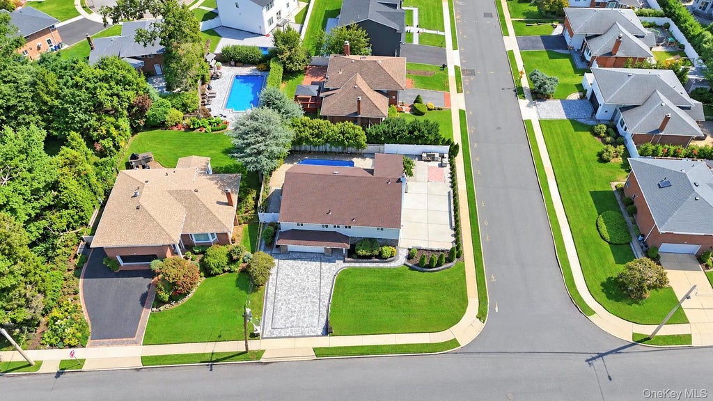 Photo of 2020 Valentines Road, Westbury, NY 11590 (MLS # 1046968)