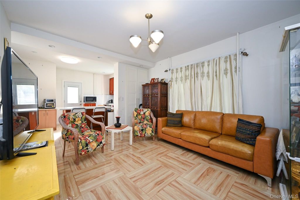 Photo of 92-38 55th Avenue, Elmhurst, NY 11373 (MLS # 942380)