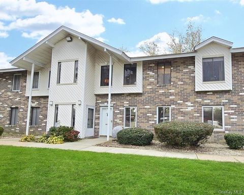 Photo of 1 El Camino Court #1E, Coram, NY 11727 (MLS # 989675)