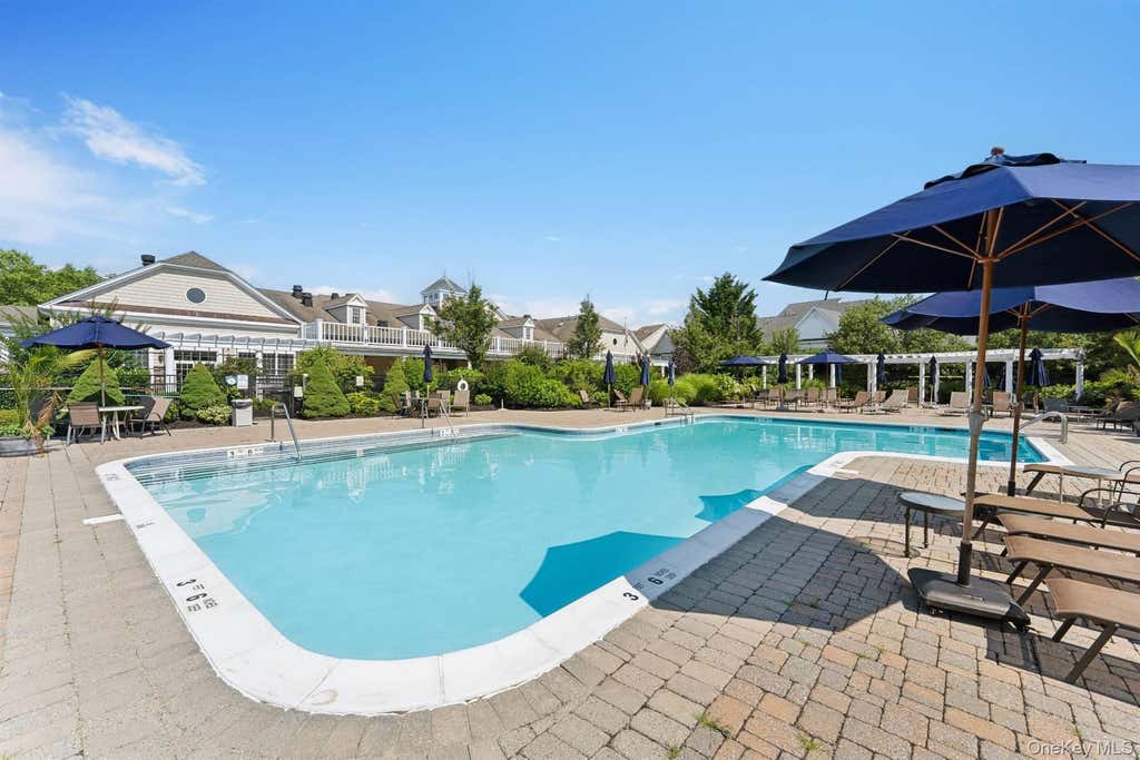 Photo of 63 Encore Boulevard, Eastport, NY 11941 (MLS # 1029011)