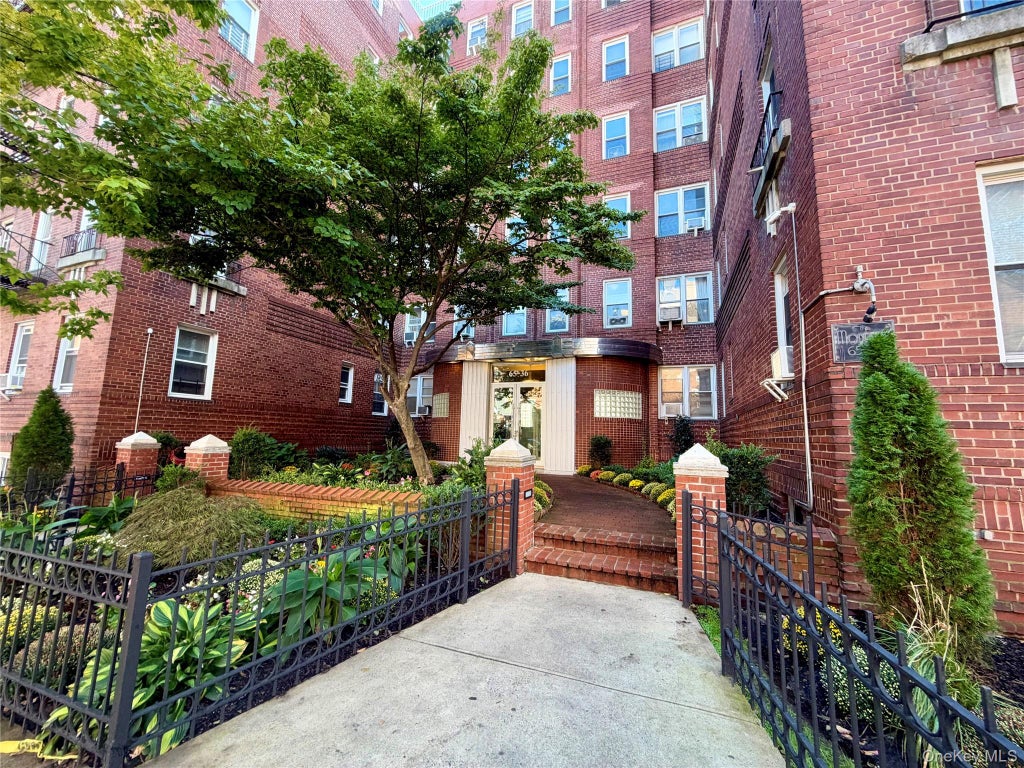 Photo of 6536 Wetherole Street #304, Rego Park, NY 11374 (MLS # 1067610)