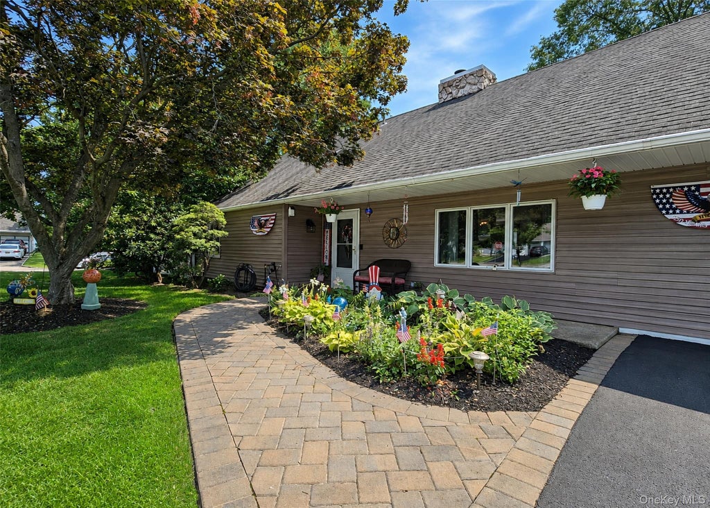 Photo of 4 Halfcircle Drive, Holbrook, NY 11741 (MLS # 1039213)