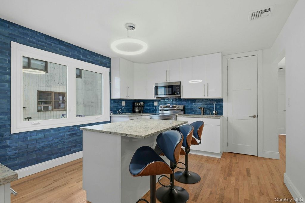 Photo of 766 Guy Lombardo Avenue, Freeport, NY 11520 (MLS # 939594)