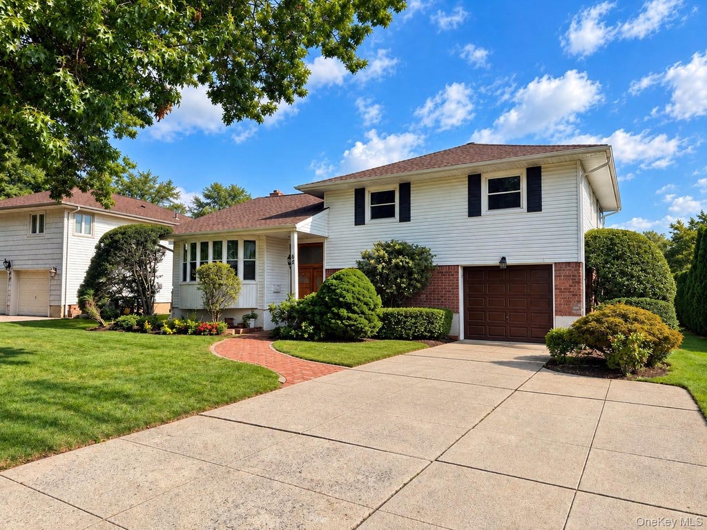 Photo of 84 Robby Lane, Manhasset Hills, NY 11040 (MLS # 1051360)