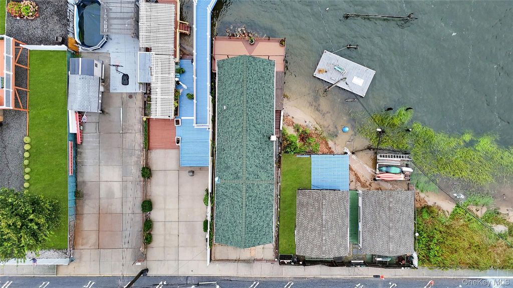 Photo of 21 Van Brunt Road, Broad Channel, NY 11693 (MLS # 927803)