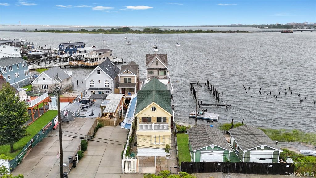 Photo of 21 Van Brunt Road, Broad Channel, NY 11693 (MLS # 927803)