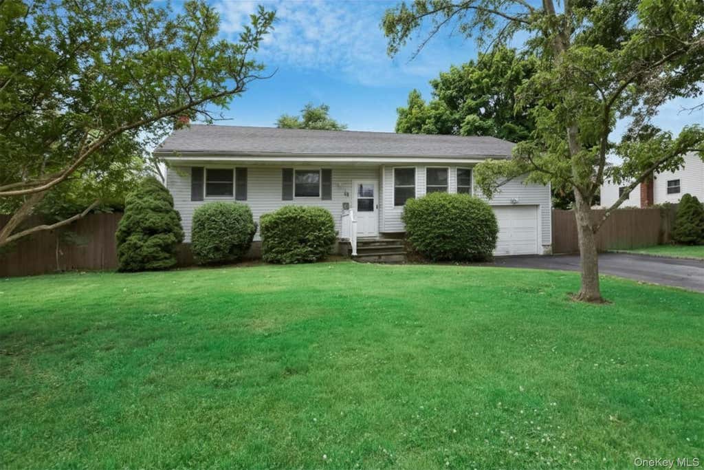 Photo of 10 Brian Drive, East Islip, NY 11730 (MLS # 1017918)