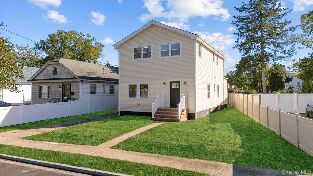 Photo of 146 Lincoln Avenue, Roosevelt, NY 11575 (MLS # 939430)