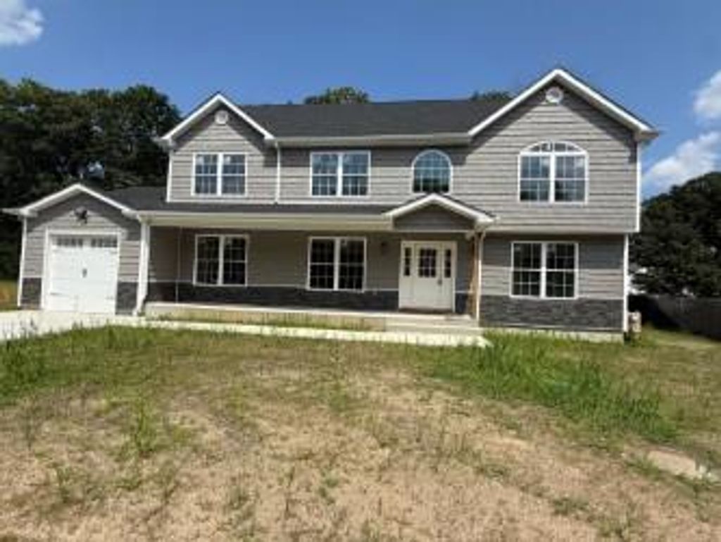Photo of 153 Calebs Path, Brentwood, NY 11717 (MLS # 896594)