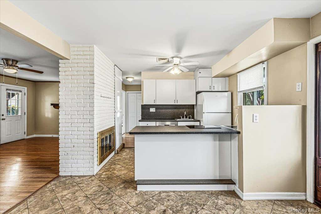 Photo of 63 Kingfisher Road, Levittown, NY 11756 (MLS # 1028173)